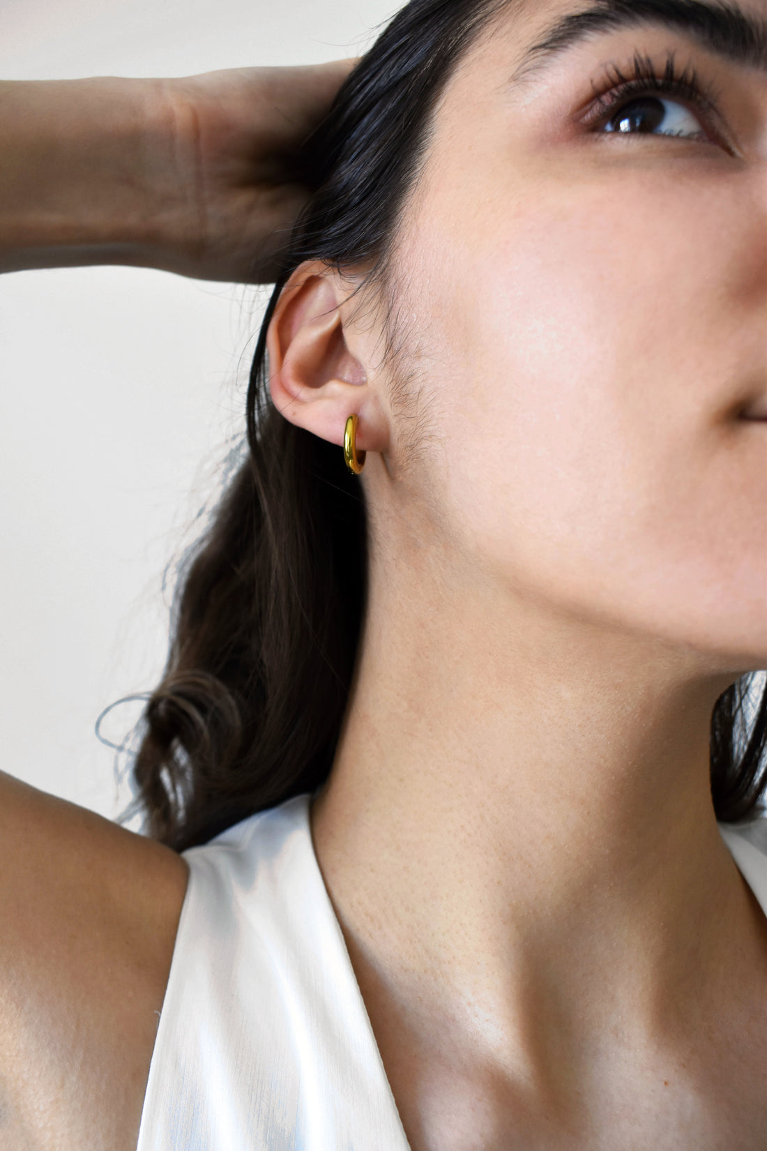 Mini Huggie Hoops in Gold